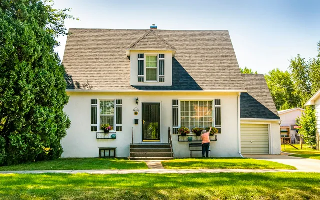 A suburban home with a green lawn