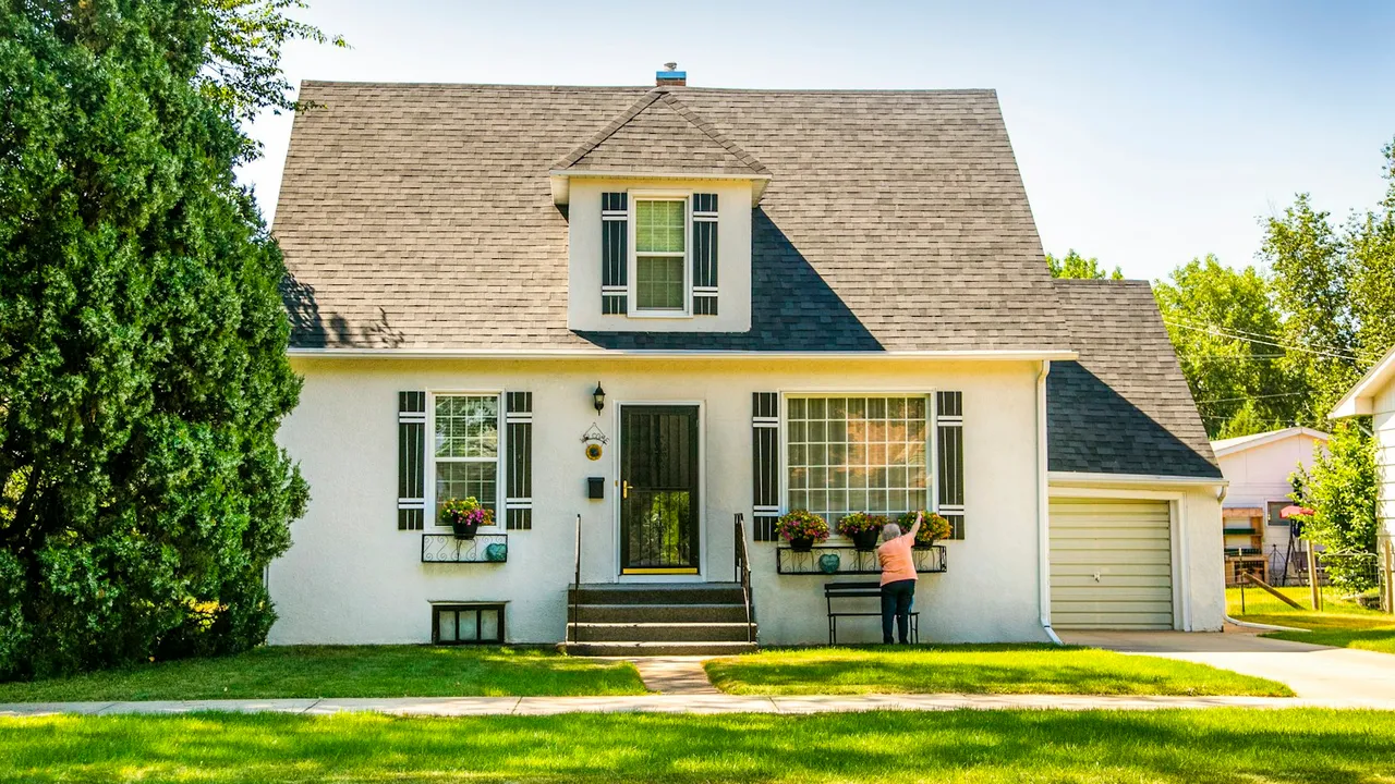A suburban home with a green lawn